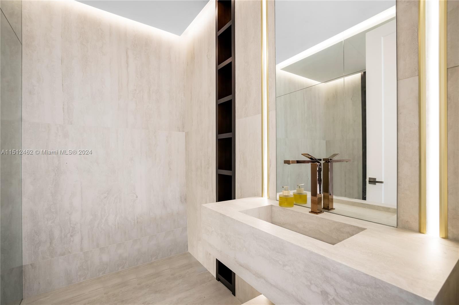 Normandy Shores Miami Beach, FL 33141 - Photo 41 of 47 a bathroom with a sink and a mirror