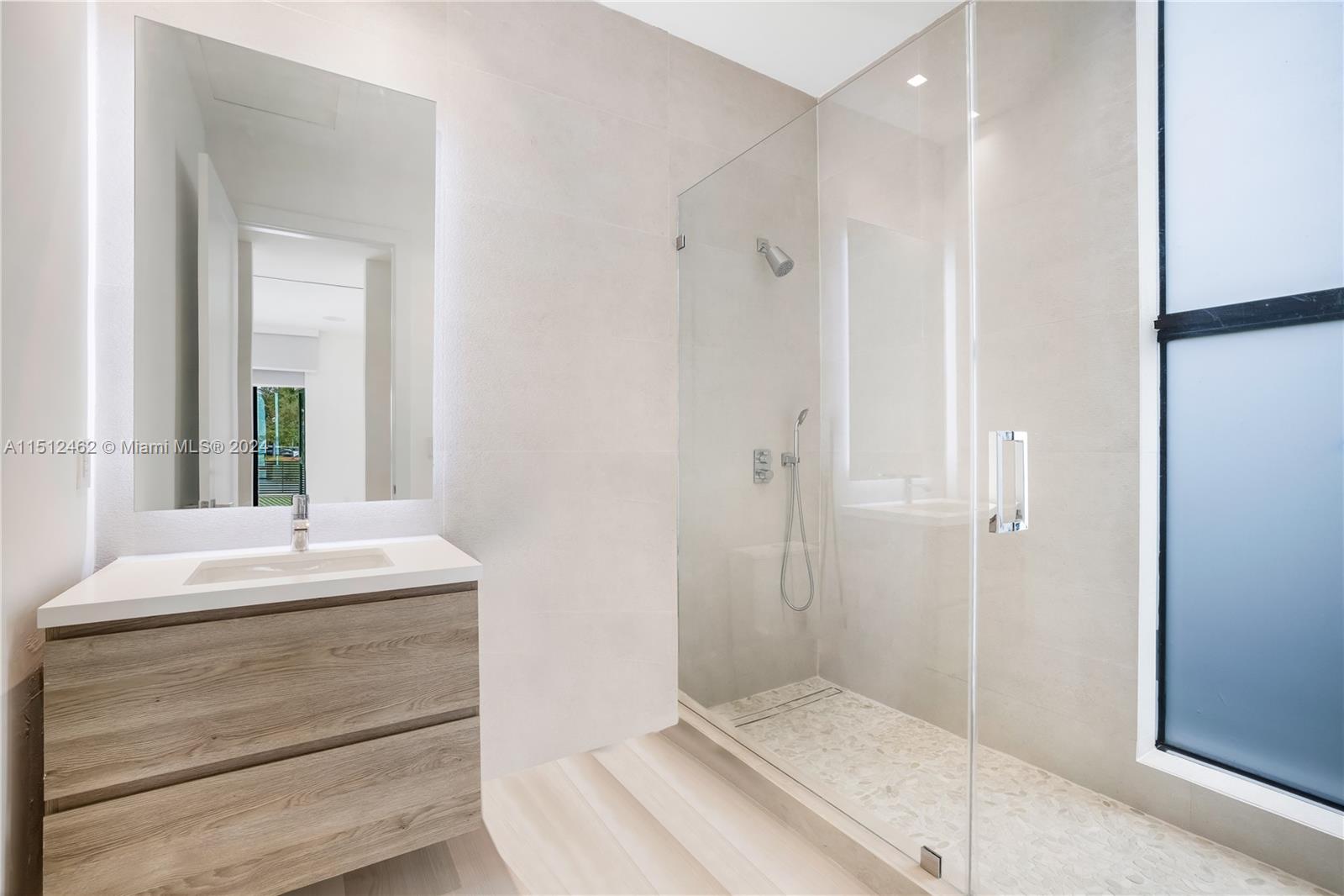 Normandy Shores Miami Beach, FL 33141 - Photo 43 of 47 a bathroom with a sink and mirror