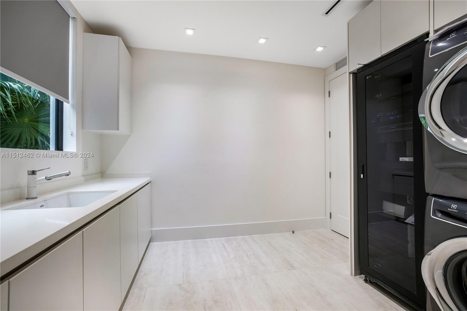 Normandy Shores Miami Beach, FL 33141 - Photo 45 of 47 a bathroom with a sink and a mirror