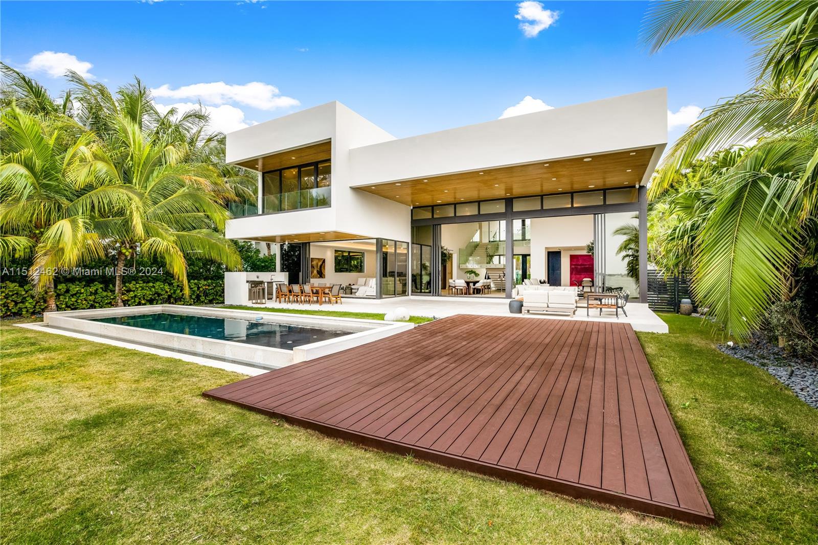 Normandy Shores Miami Beach, FL 33141 - Photo 5 of 47 a swimming pool with outdoor seating and yard