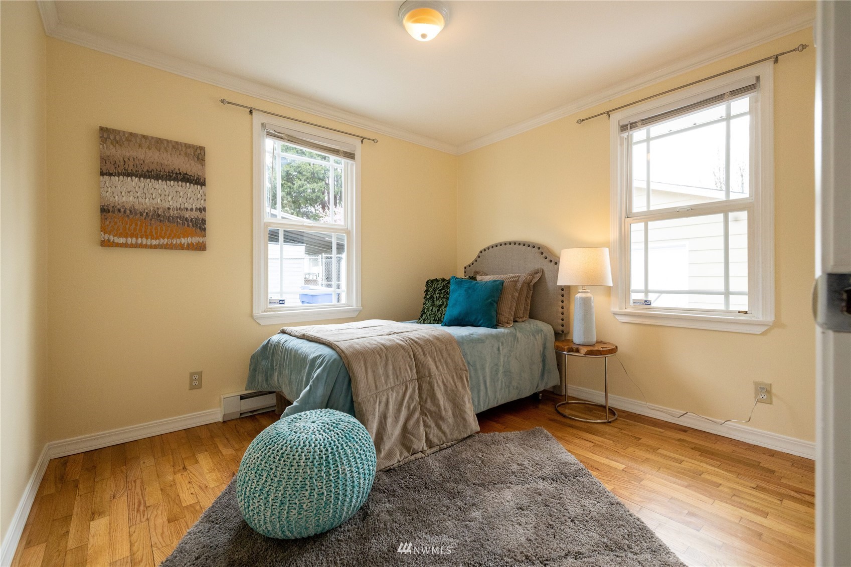 3129 Southeast 5th Street Renton, WA 98058 - Photo 13 of 27 a bedroom with a bed and a window