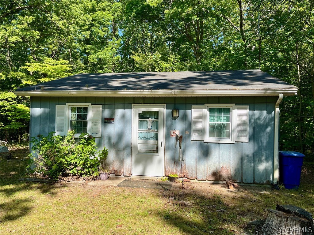 11634 Patillo Road Dewitt, VA 23840 - Photo 4 of 7 a backyard of a house with outdoor seating