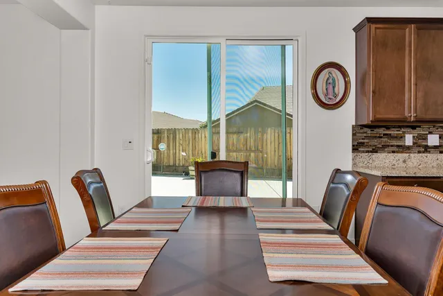 a stove sitting inside of a kitchen