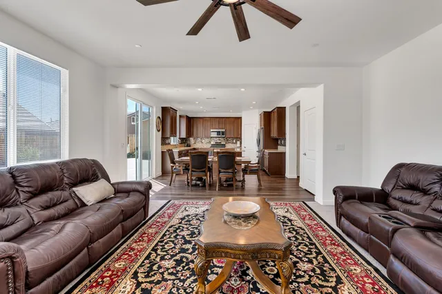 a living room with furniture or couch and a table