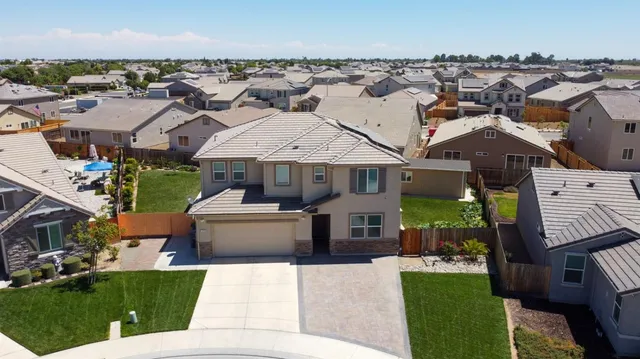 a house view with a garden space