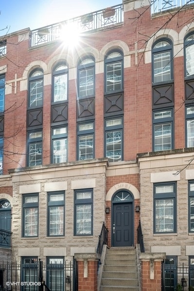 349 West Superior Street, Unit B Chicago, IL 60654 - Photo 1 of 27 a front view of a building with windows