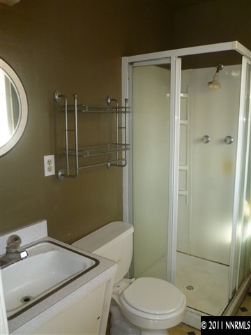 1290 Earl Drive Reno, NV 89503 - Photo 12 of 13 a bathroom with a toilet and a shower