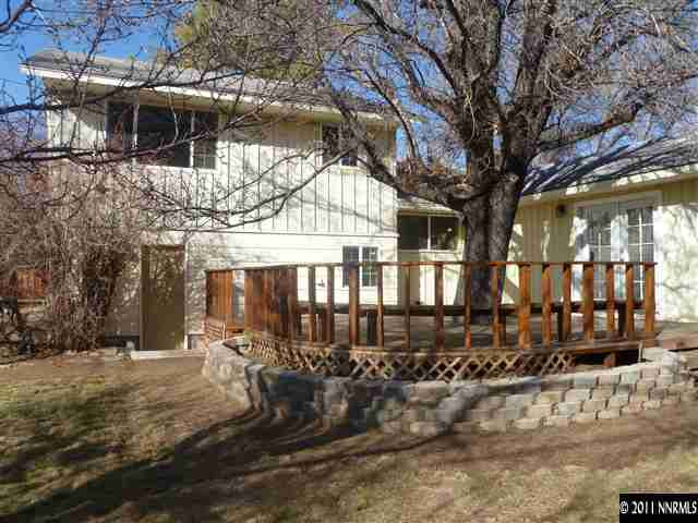 1290 Earl Drive Reno, NV 89503 - Photo 8 of 13 a front view of a house with a yard