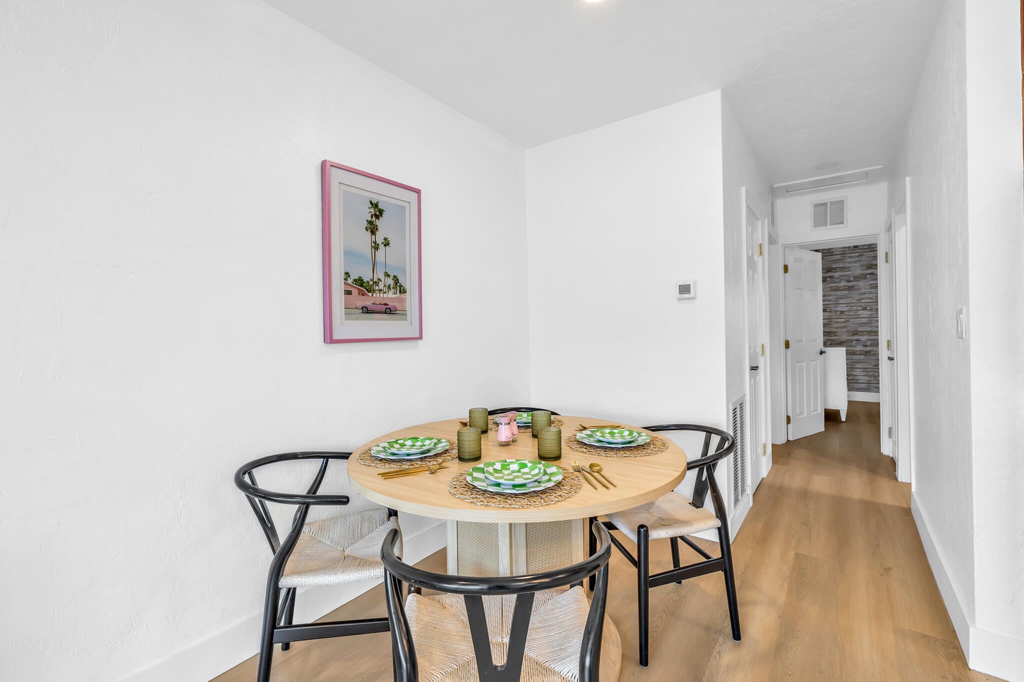 2412 Northeast 4th Street, Unit W Pompano Beach, FL 33062 - Photo 7 of 18 a view of a dining room with furniture and wooden floor
