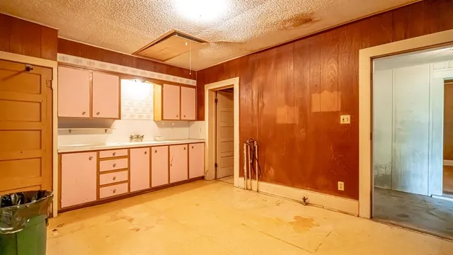 a view of a bathroom with a tub and a sink
