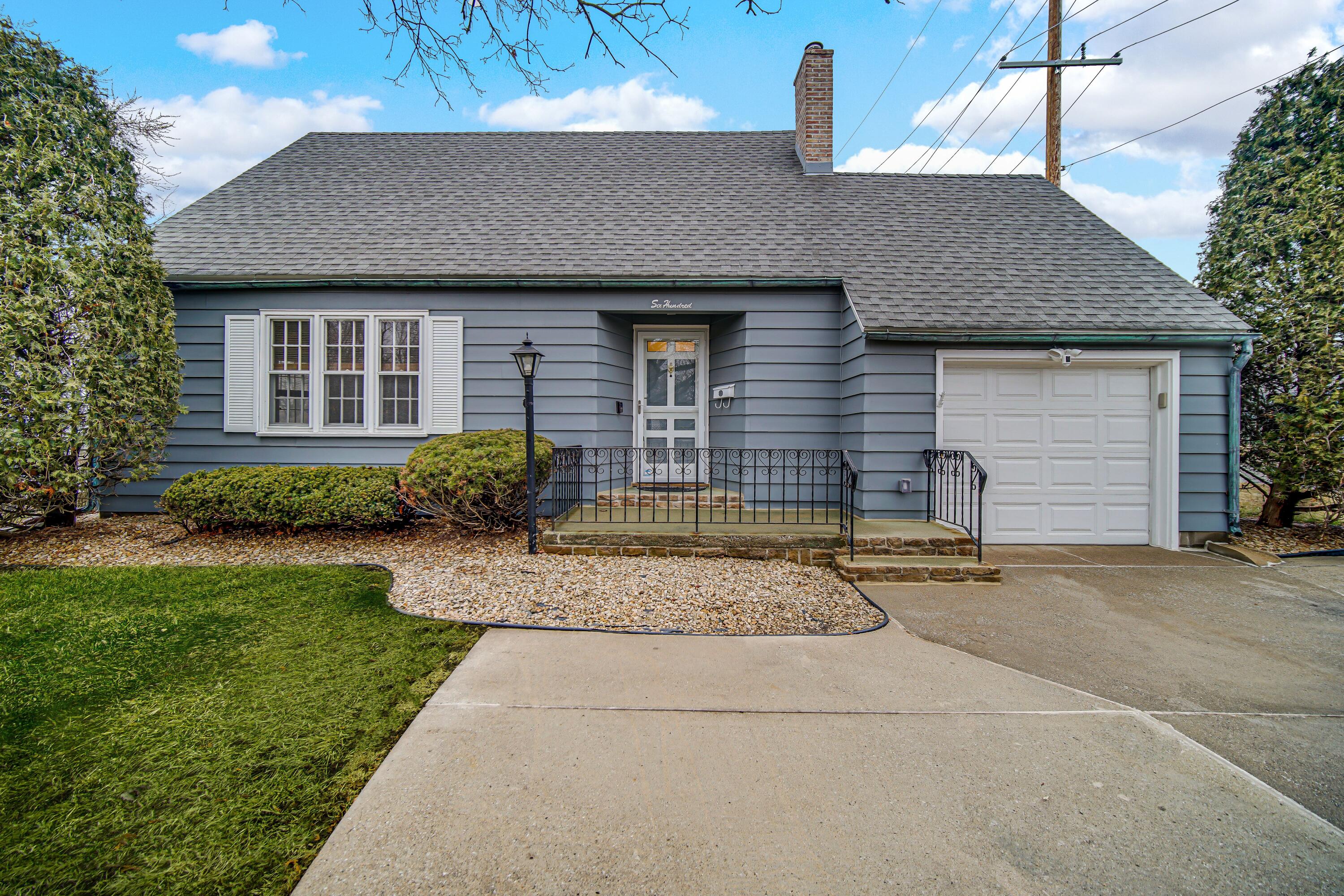 600 West North Street Crown Point, IN 46307 - Photo 1 of 24 a front view of a house with garden