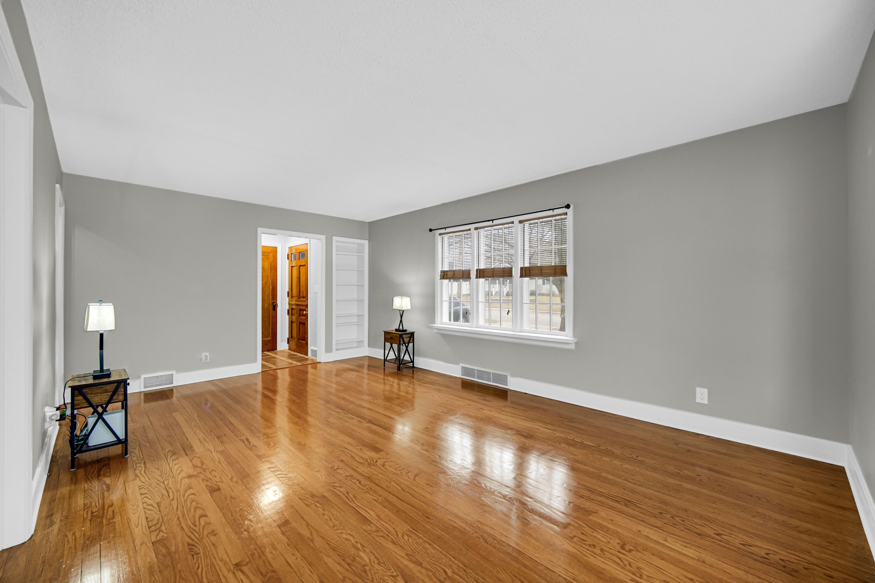 600 West North Street Crown Point, IN 46307 - Photo 5 of 24 a view of empty room with wooden floor and a window