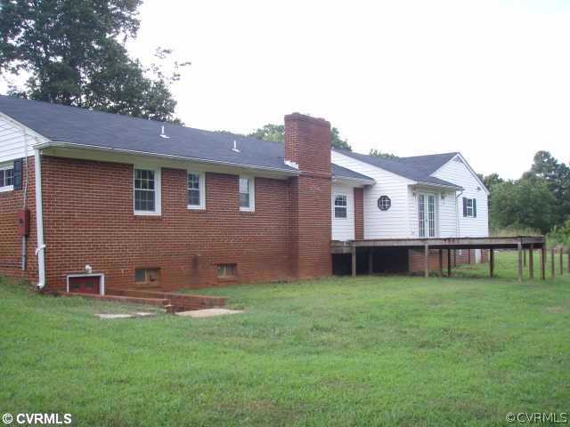 1851 Rabbit Warren Road Manakin-Sabot, VA 23103 - Photo 2 of 7 a view of a house with a backyard