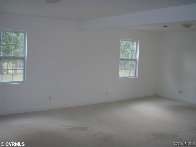 1851 Rabbit Warren Road Manakin-Sabot, VA 23103 - Photo 4 of 7 an empty room with a window