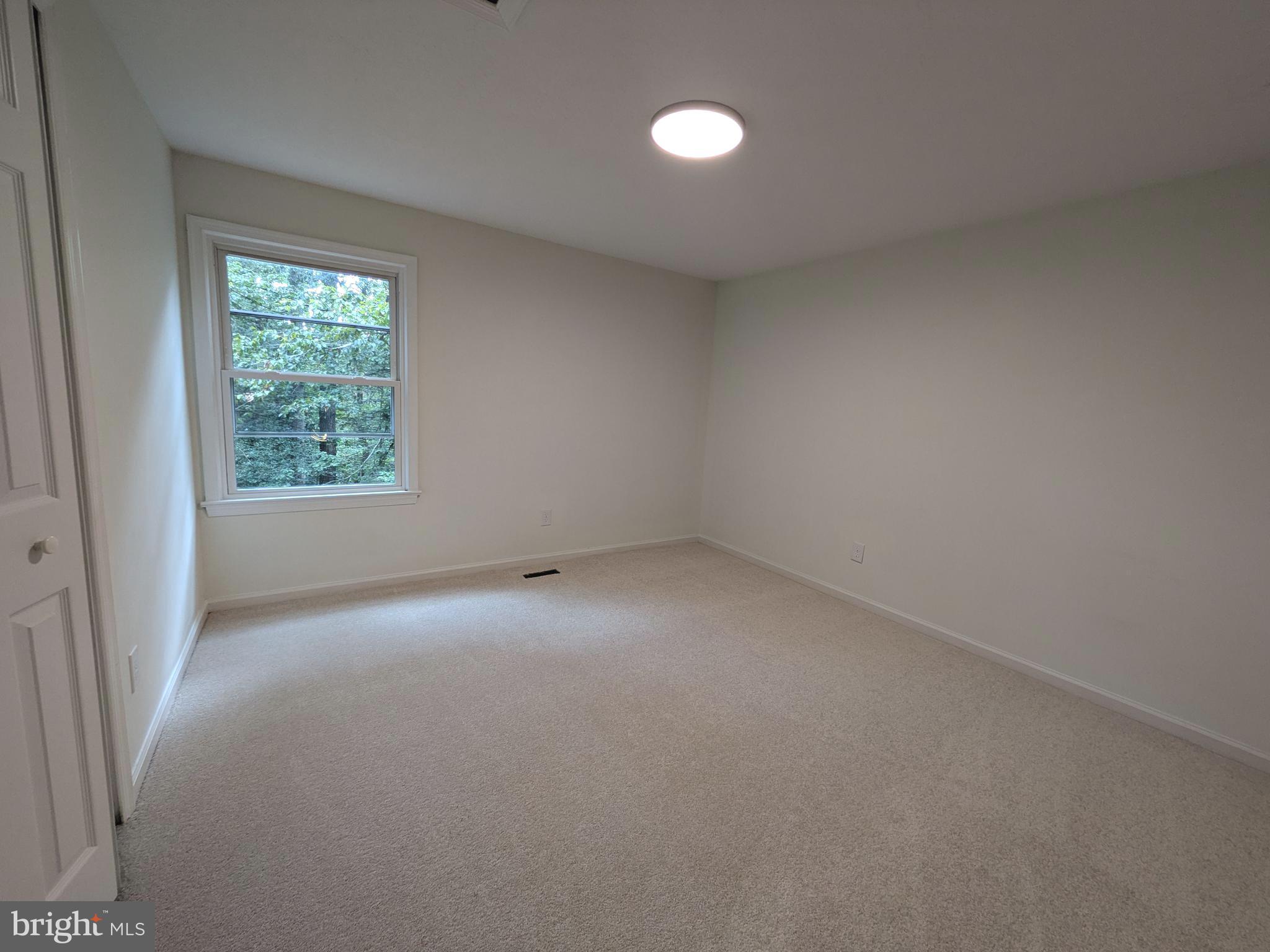 1019 Isabella Drive Stafford, VA 22554 - Photo 14 of 20 a view of an empty room and window