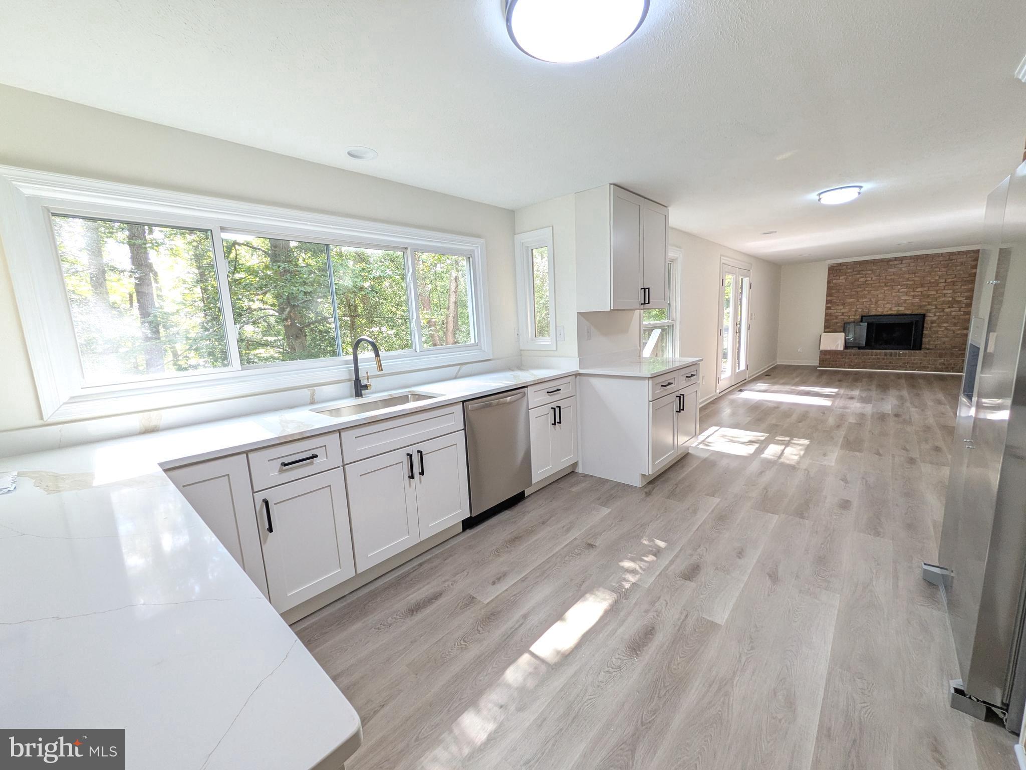 1019 Isabella Drive Stafford, VA 22554 - Photo 3 of 20 a large white kitchen with a window