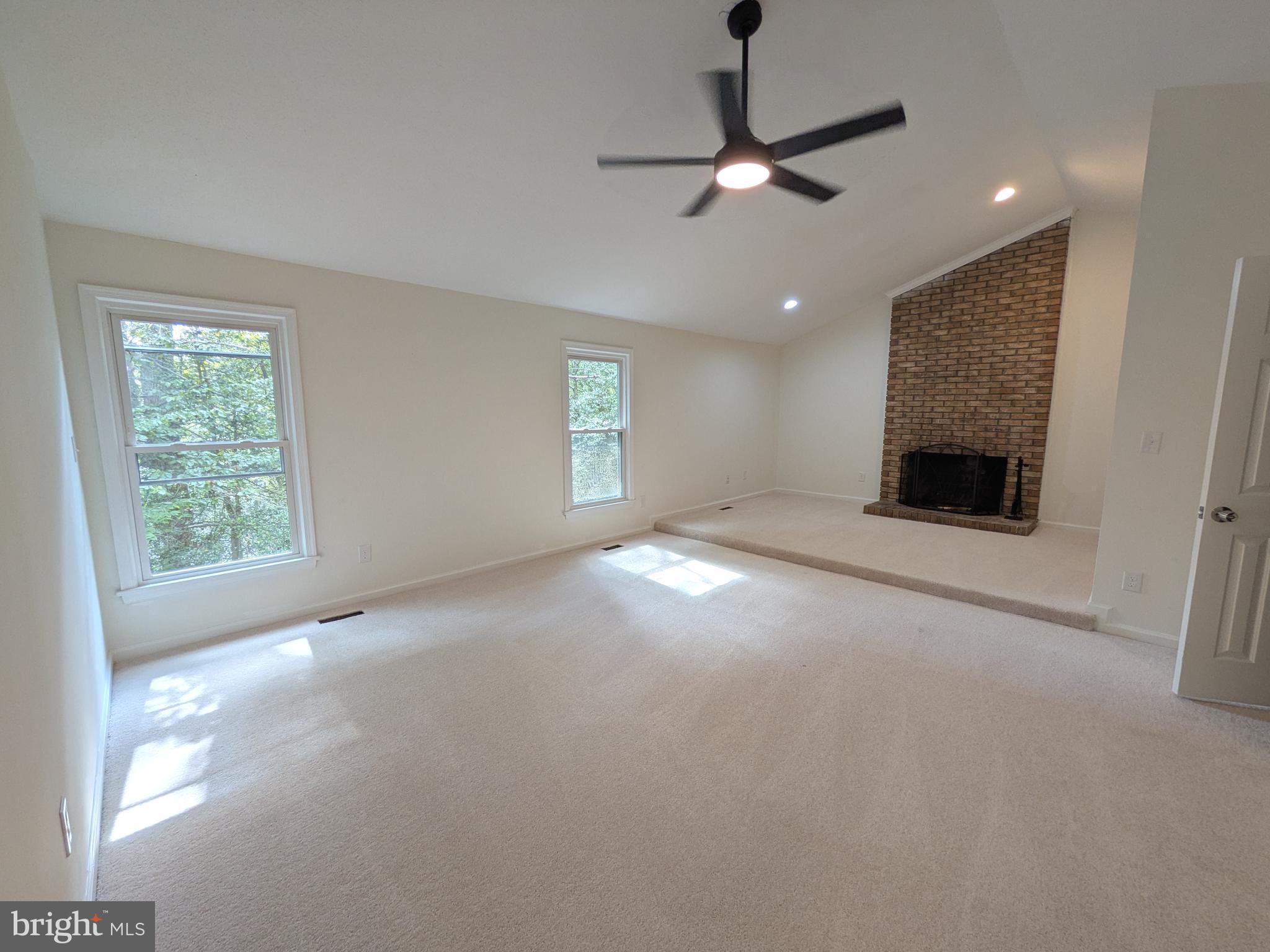 1019 Isabella Drive Stafford, VA 22554 - Photo 9 of 20 a view of a livingroom with a ceiling fan and window