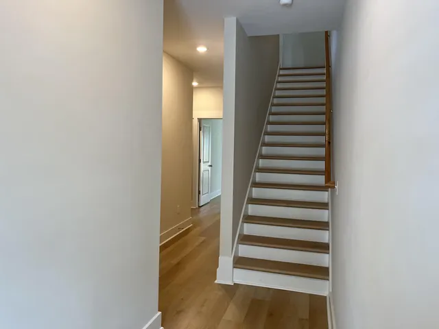 a view of entryway with wooden floor