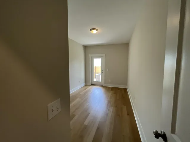 a bathroom with a sink toilet and mirror