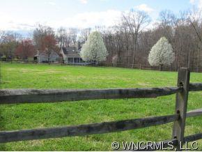 2301 North River Road Tryon, NC 28782 - Photo 12 of 12 a view of a yard with large trees