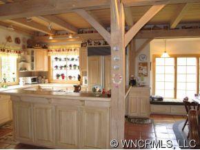 2301 North River Road Tryon, NC 28782 - Photo 3 of 12 a view of a living room and kitchen