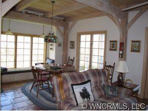 2301 North River Road Tryon, NC 28782 - Photo 4 of 12 a view of a dining room with furniture window and outside view