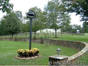 2301 North River Road Tryon, NC 28782 - Photo 9 of 12 a view of a garden with a fountain