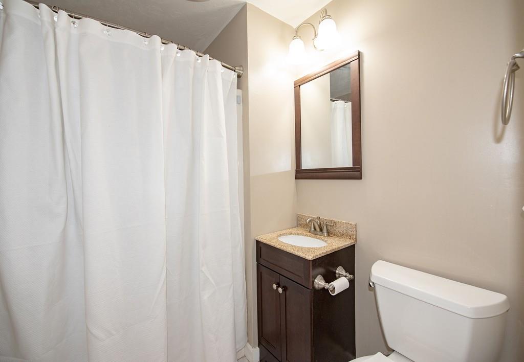195 Kaleva Road Lancaster, MA 01523 - Photo 18 of 39 a white toilet sitting next to a white sink