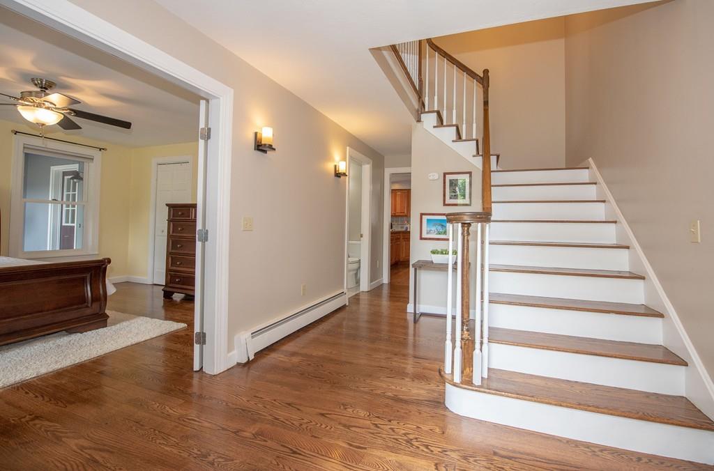 195 Kaleva Road Lancaster, MA 01523 - Photo 3 of 39 a view of entryway and hall with wooden floor