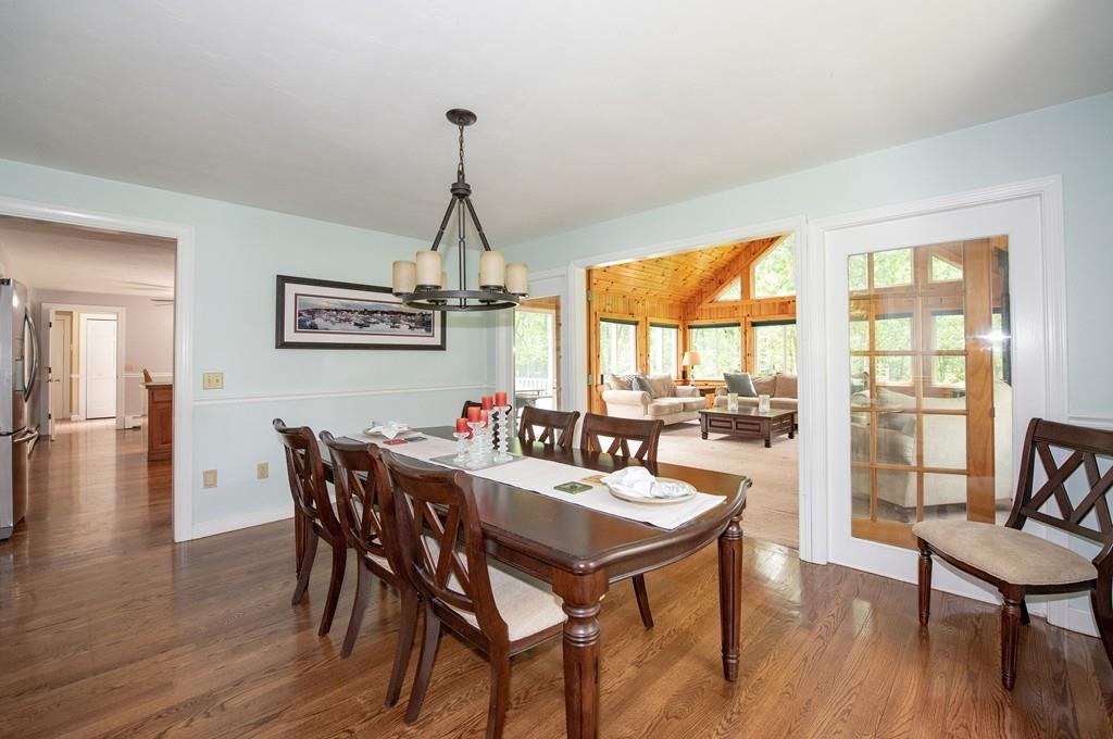 195 Kaleva Road Lancaster, MA 01523 - Photo 10 of 39 a view of a dining room with furniture window and wooden floor