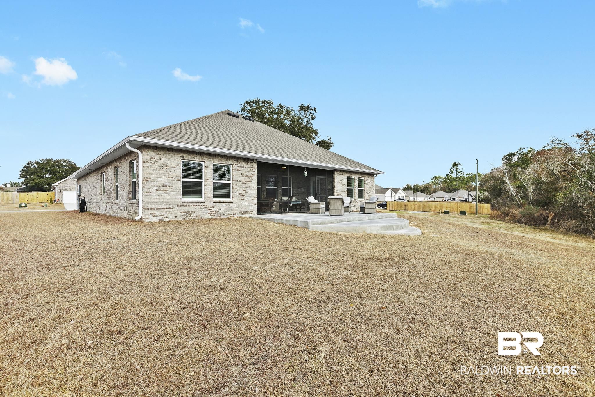 1141 Pencarro Boulevard Foley, AL 36535 - Photo 58 of 70 Back of house featuring a patio area