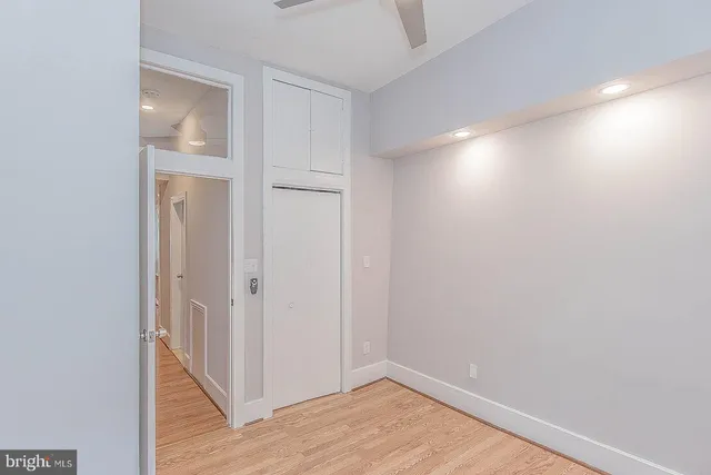 a view of entryway with wooden floor