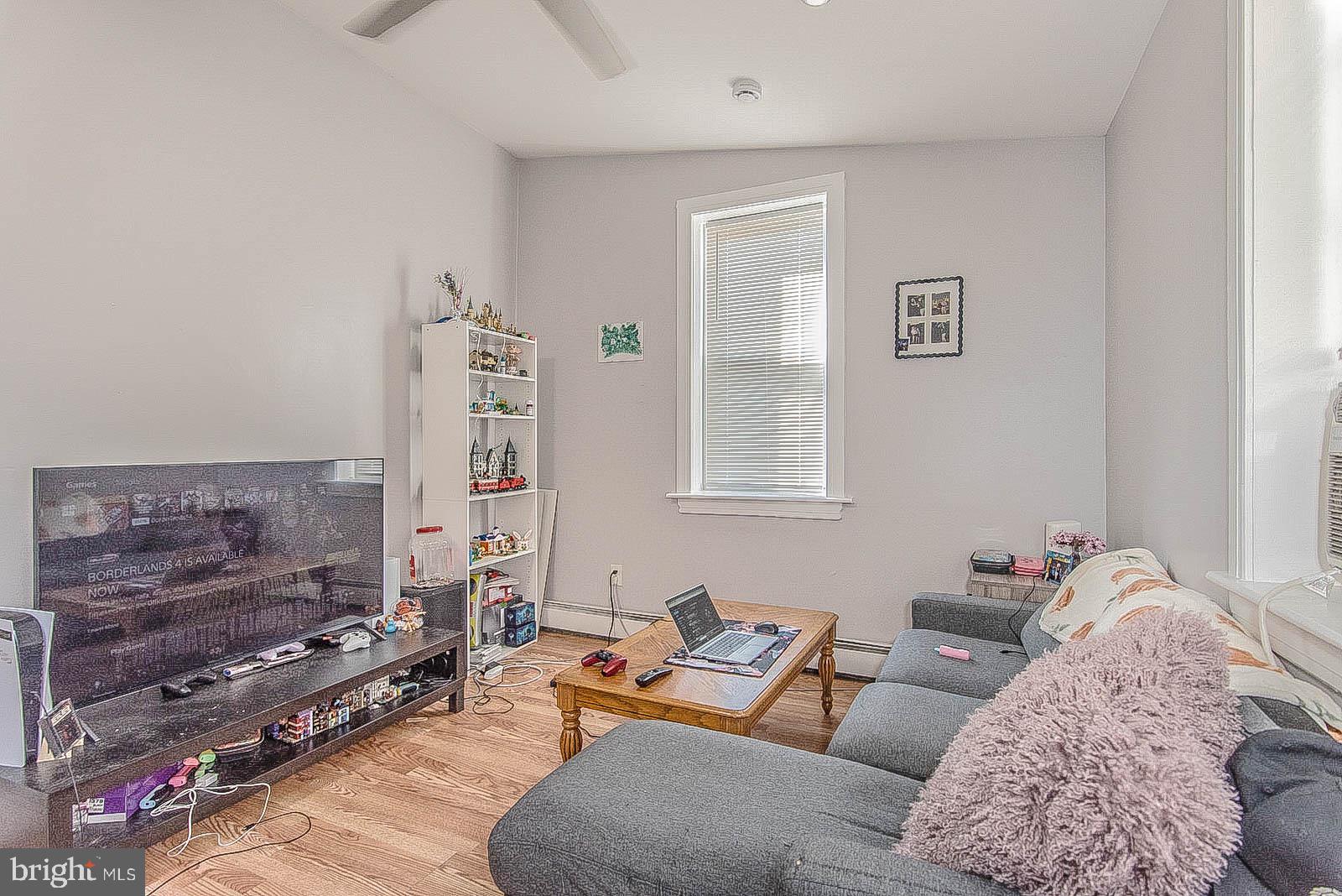 2022 Ogden Street Philadelphia, PA 19130 - Photo 32 of 44 a bedroom with furniture and a bed