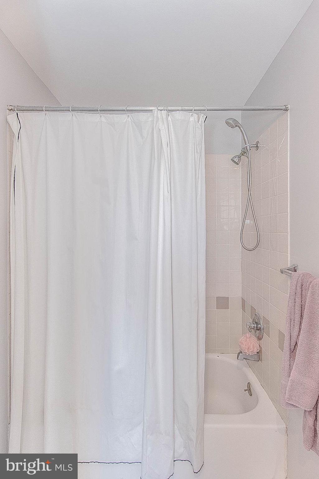 2022 Ogden Street Philadelphia, PA 19130 - Photo 36 of 44 a bathroom with a shower and a bath tub