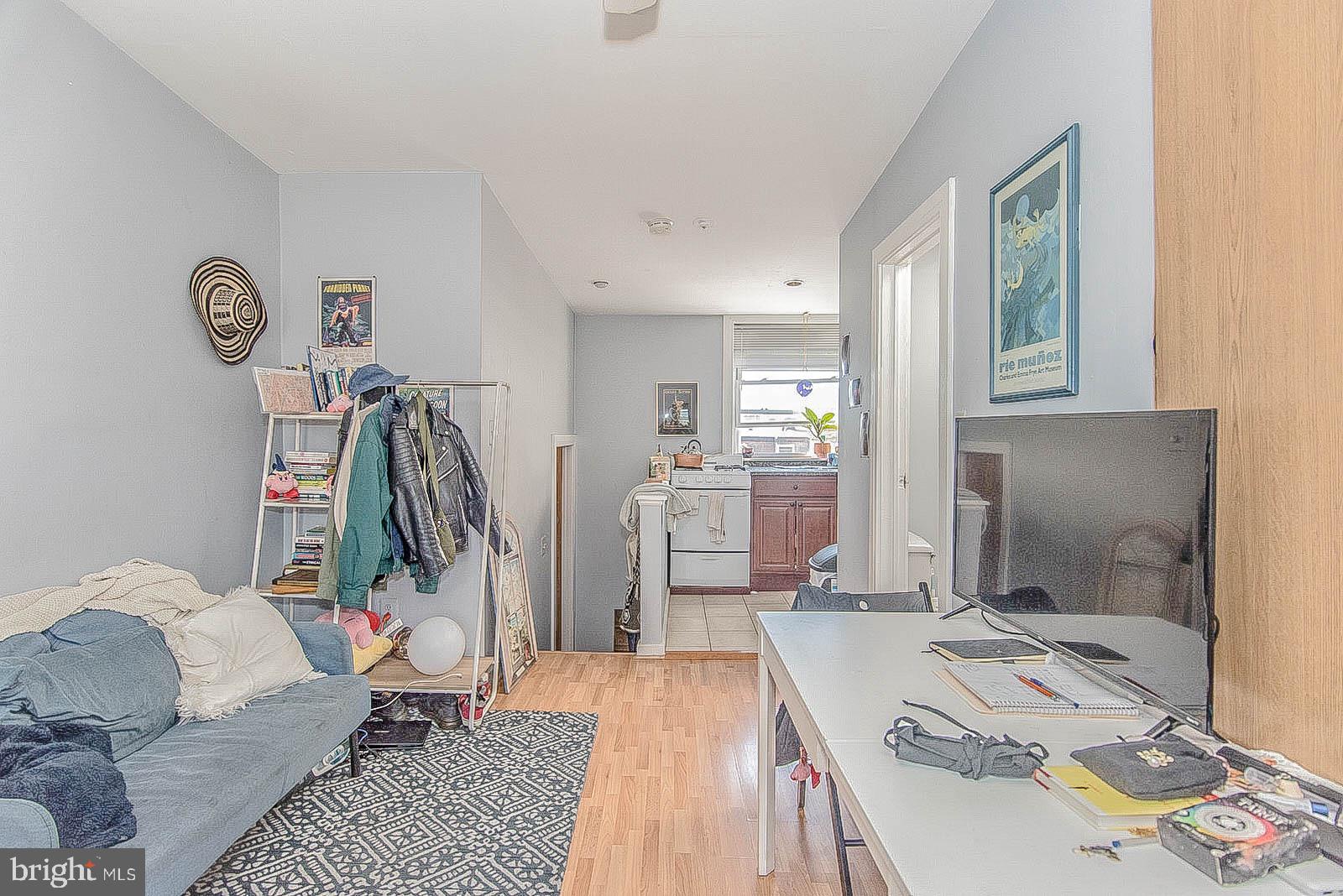 2022 Ogden Street Philadelphia, PA 19130 - Photo 39 of 44 a living room with furniture and a wooden floor