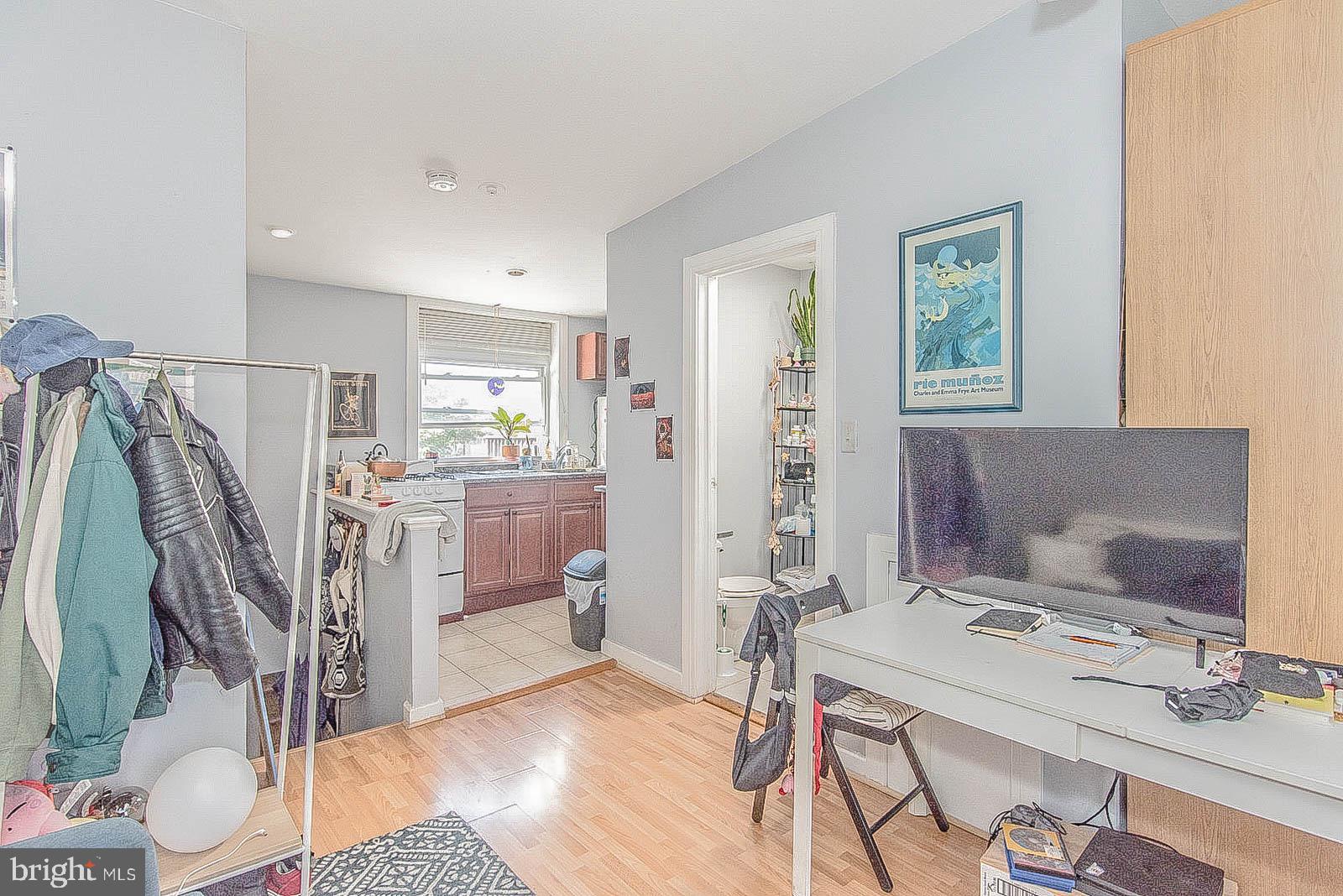 2022 Ogden Street Philadelphia, PA 19130 - Photo 40 of 44 a bathroom with a sink a mirror and a shower