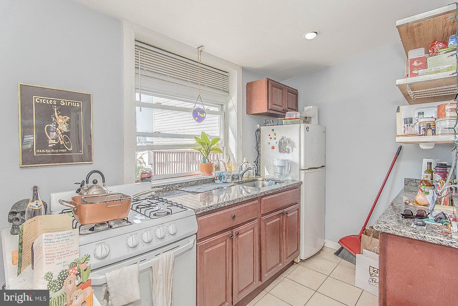 2022 Ogden Street Philadelphia, PA 19130 - Photo 41 of 44 a room with a sink cabinets and window