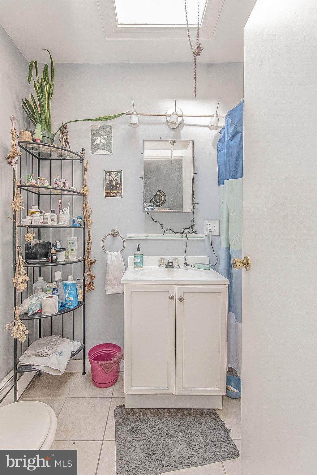 2022 Ogden Street Philadelphia, PA 19130 - Photo 42 of 44 a utility room with cabinets and washer