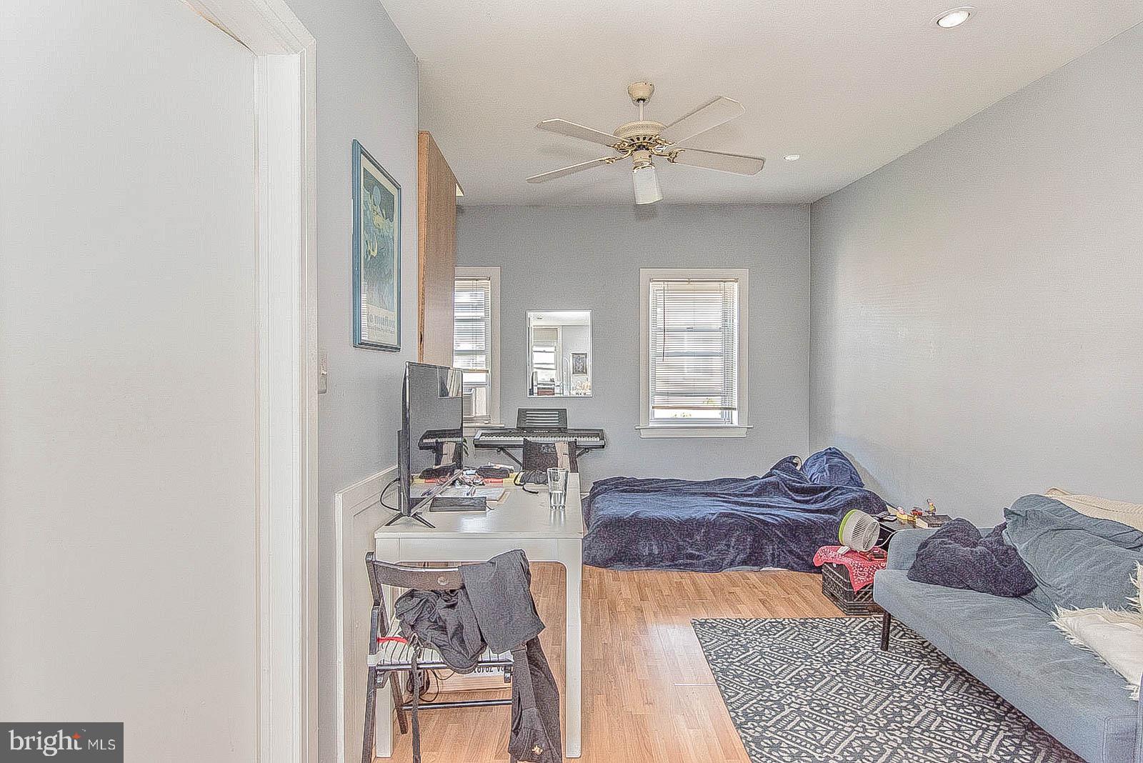 2022 Ogden Street Philadelphia, PA 19130 - Photo 43 of 44 a living room with furniture and wooden floor