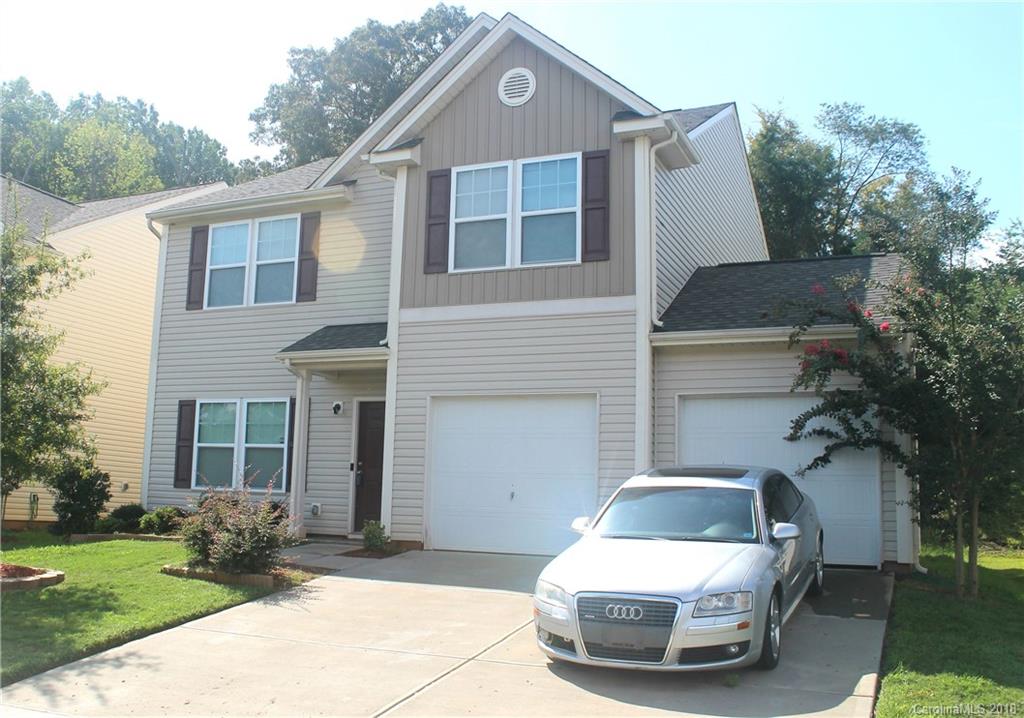 519 Rook Road Charlotte, NC 28216 - Photo 1 of 20 a front view of a house with a yard