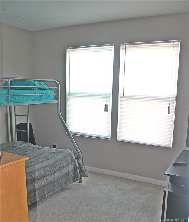 519 Rook Road Charlotte, NC 28216 - Photo 20 of 20 a bedroom with a bed and a window