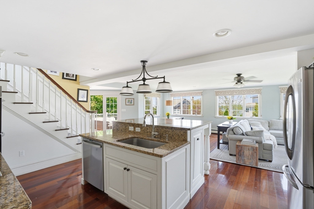 3 Talbot Road Hingham, MA 02043 - Photo 10 of 34 a kitchen with sink cabinets and wooden floor