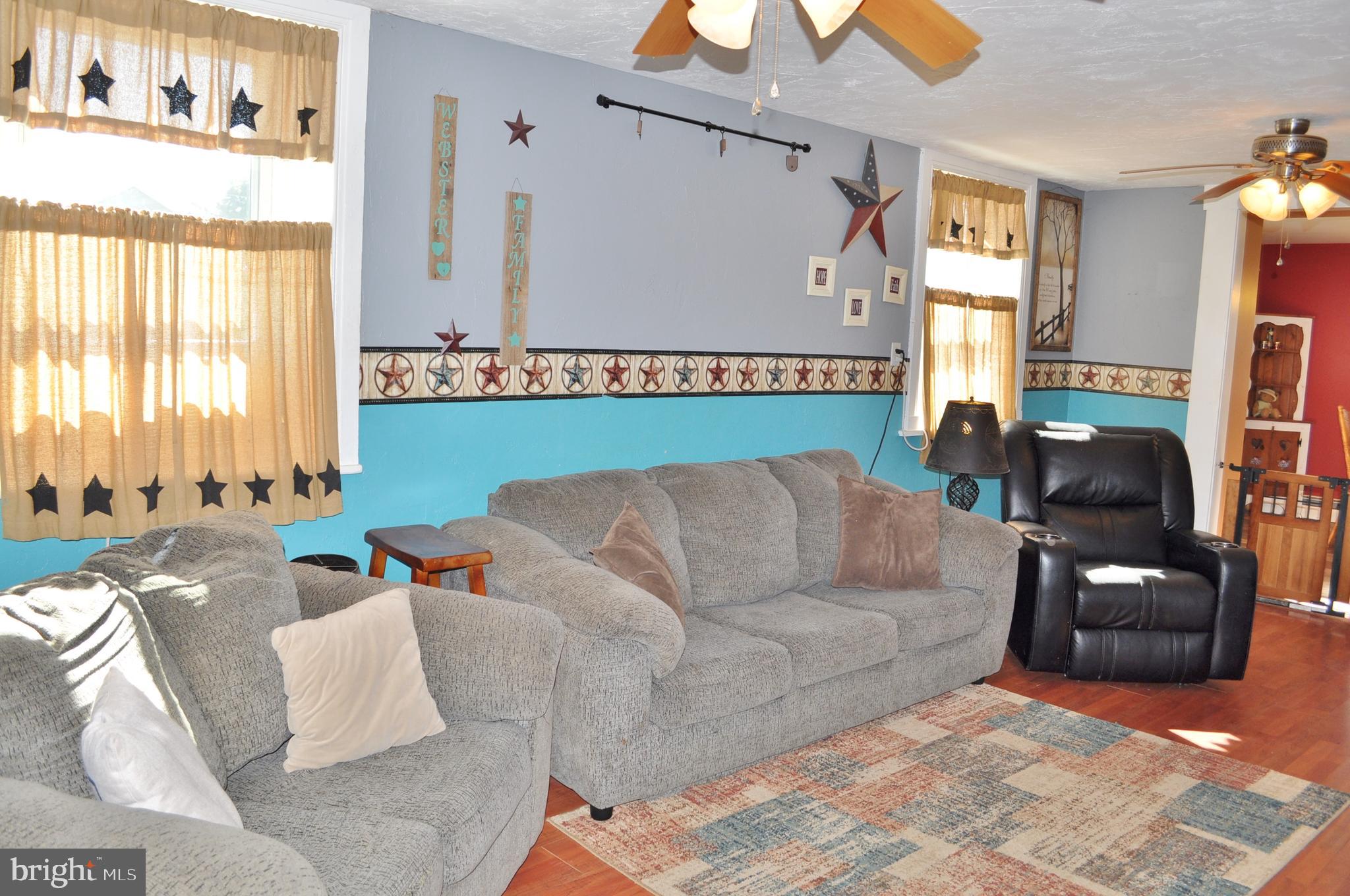 1976 Stoverstown Road Spring Grove, PA 17362 - Photo 17 of 66 a living room with furniture and a window