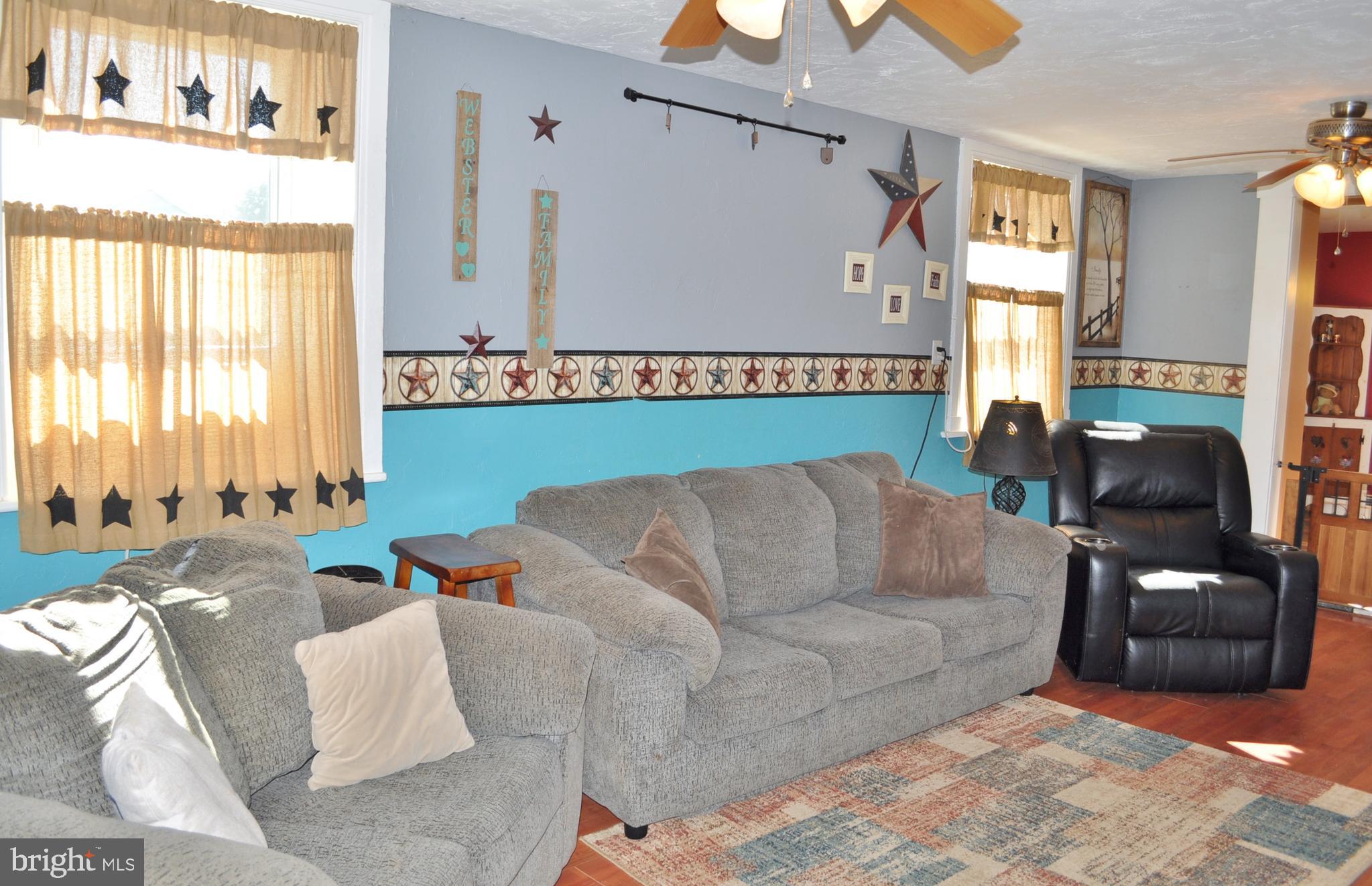 1976 Stoverstown Road Spring Grove, PA 17362 - Photo 18 of 66 a living room with furniture and a window