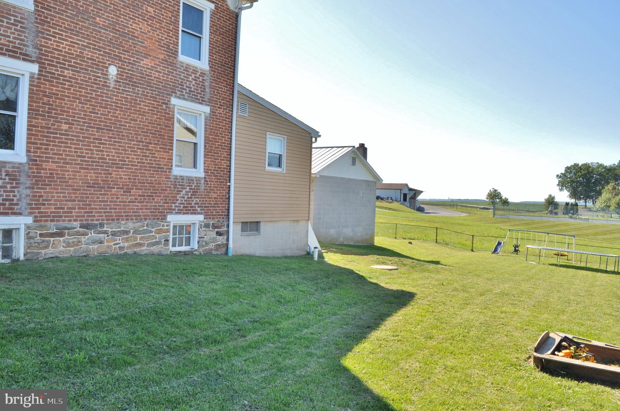1976 Stoverstown Road Spring Grove, PA 17362 - Photo 4 of 66 a backyard of a house with lots of green space