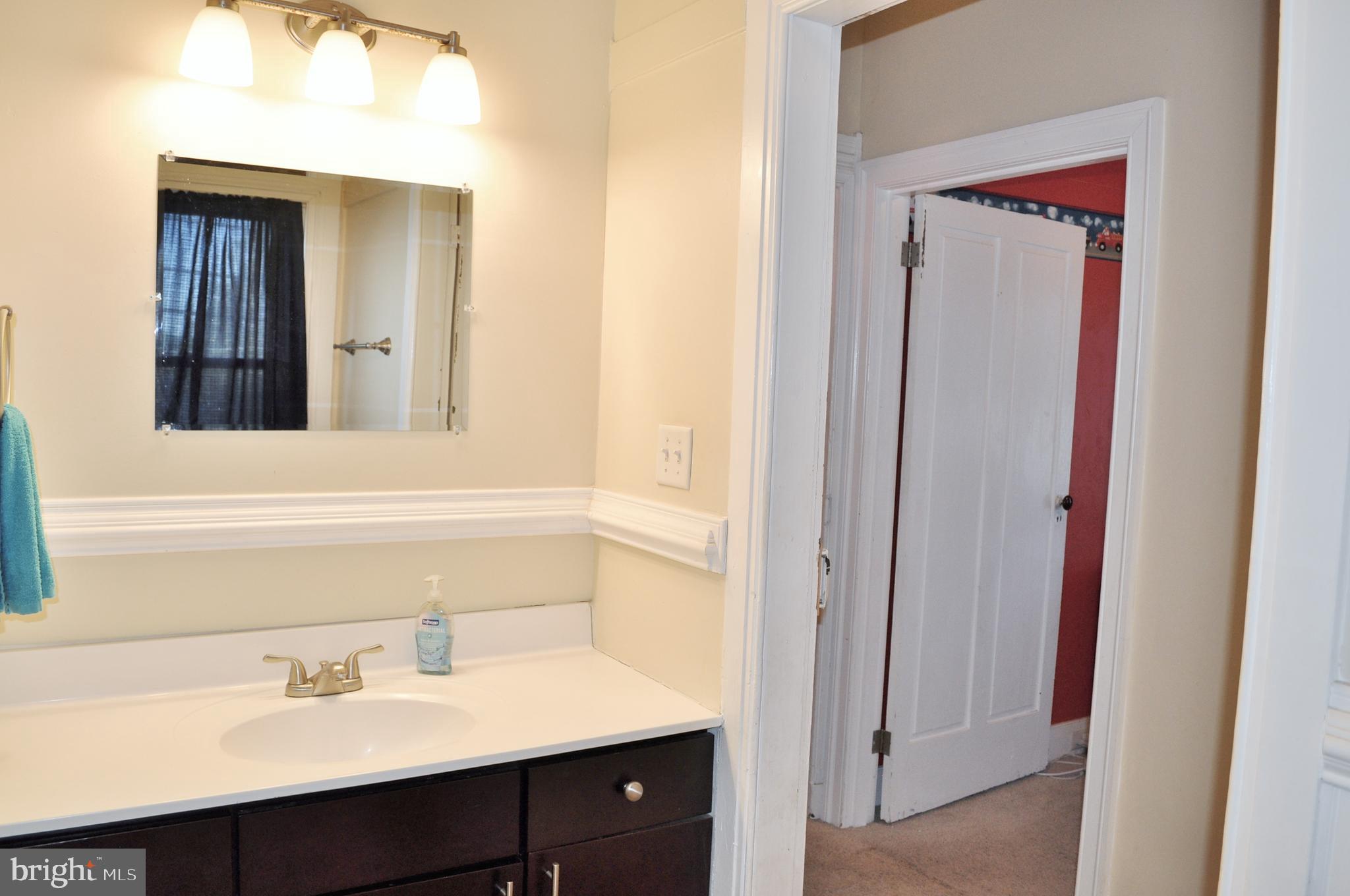 1976 Stoverstown Road Spring Grove, PA 17362 - Photo 47 of 66 a bathroom with a sink and a mirror