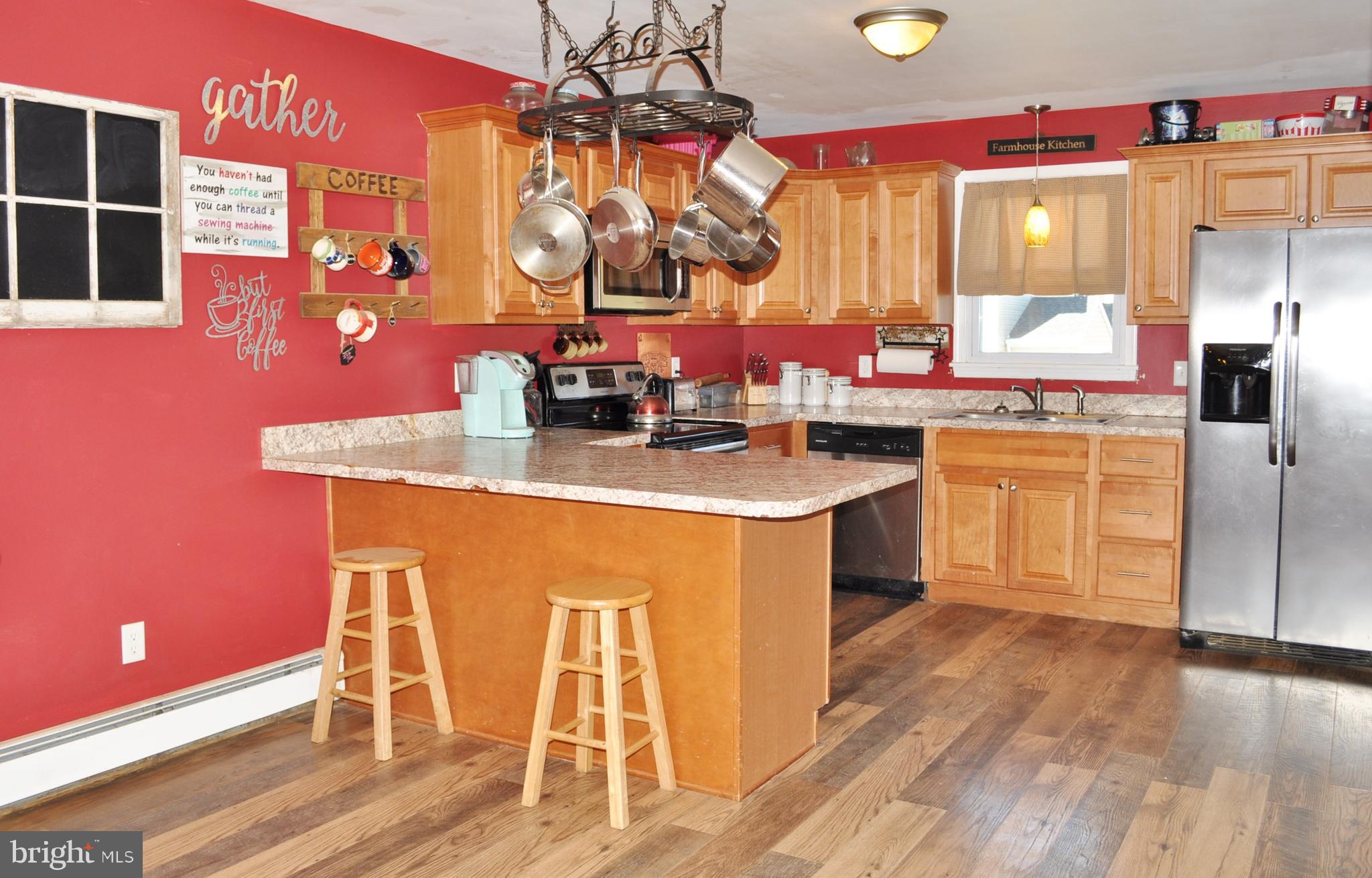 1976 Stoverstown Road Spring Grove, PA 17362 - Photo 5 of 66 a kitchen with a sink cabinets and wooden floor