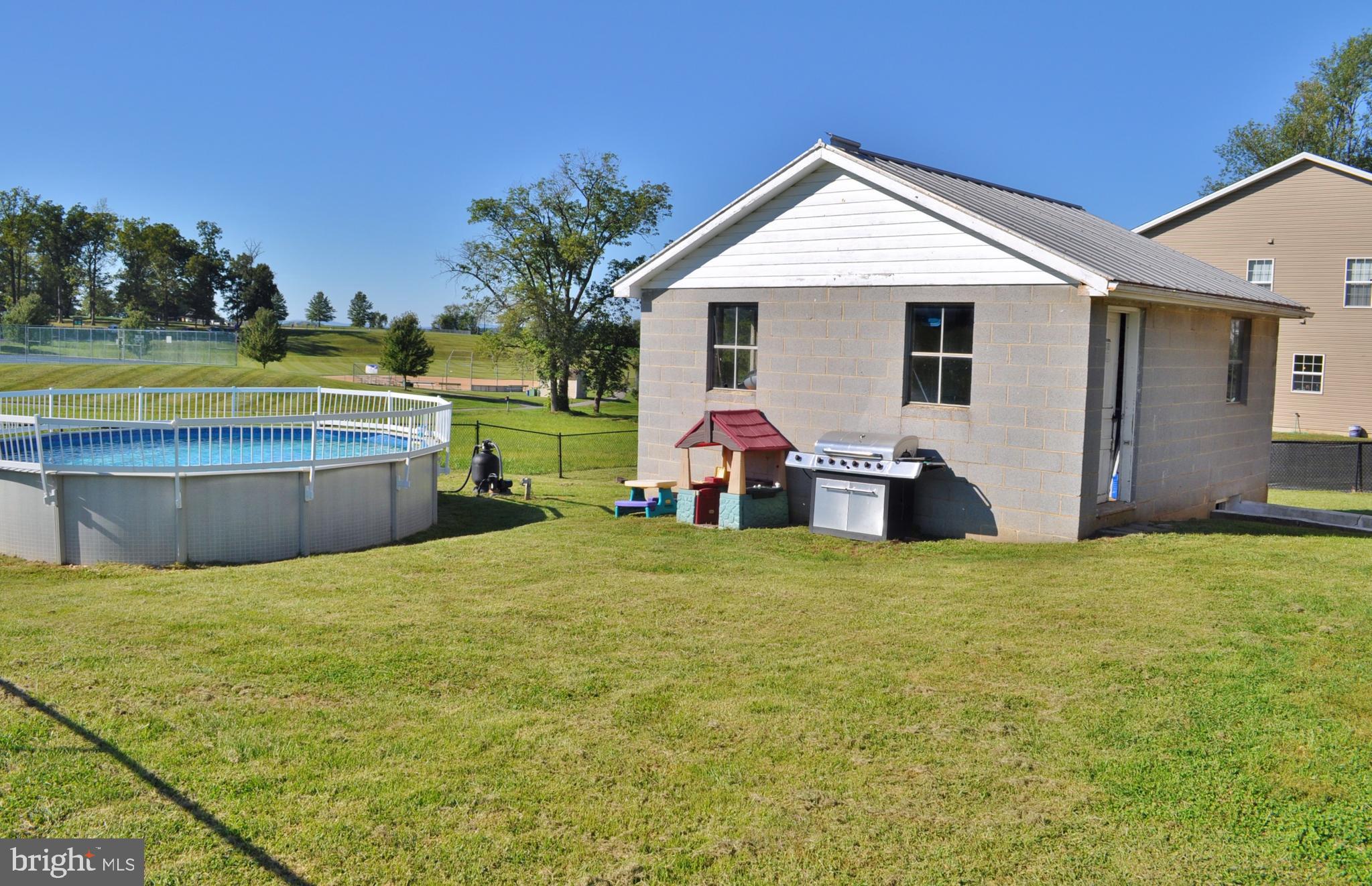 1976 Stoverstown Road Spring Grove, PA 17362 - Photo 55 of 66 a view of a house with backyard and sitting area