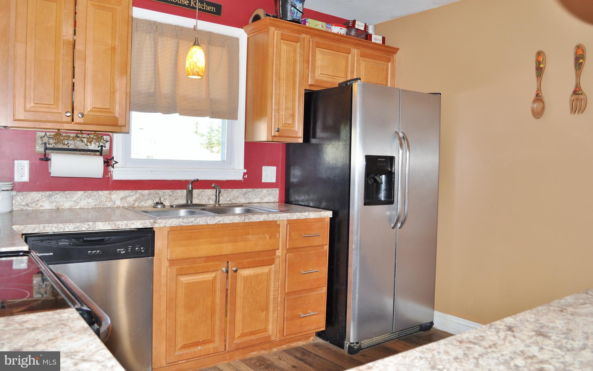 1976 Stoverstown Road Spring Grove, PA 17362 - Photo 9 of 66 a kitchen with stainless steel appliances granite countertop a refrigerator and a sink
