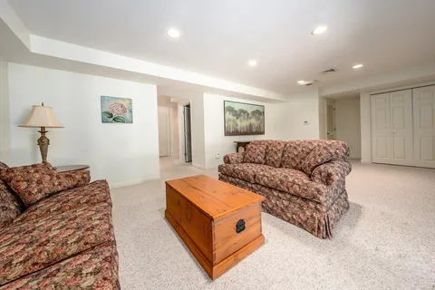 a living room with furniture and a couch
